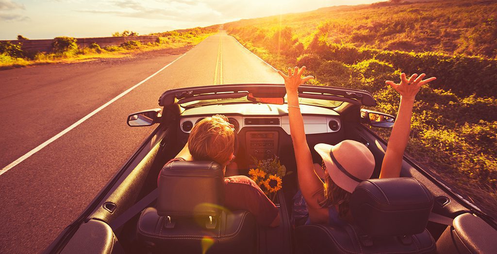 Happy Sharebox customers driving car on roadtrip